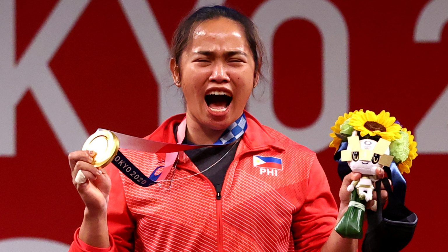 Weightlifter Hidilyn Diaz Wins First-ever Olympic Gold Medal